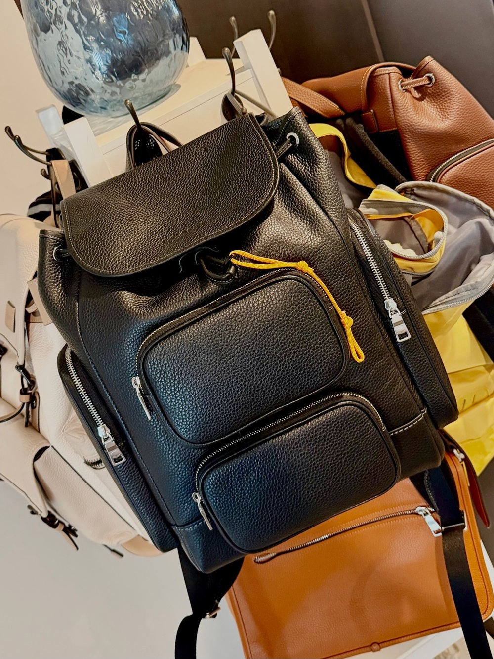 Coach Black Leather Backpack with Yellow Zip Pull